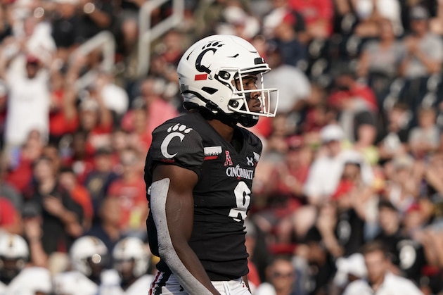 Cincinnati Bearcats wide receiver Michael Young Jr. (8) reacts after making a catch during the second half of an NCAA college football game against Murray State Saturday, Sept. 11, 2021, in Cincinnati. (AP Photo/Jeff Dean)
