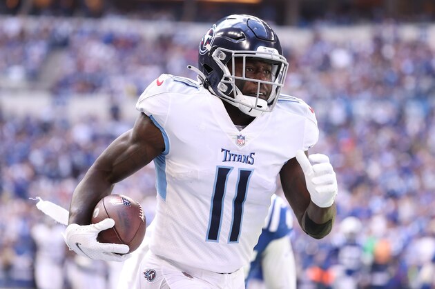 INDIANAPOLIS, INDIANA - OCTOBER 31:   A.J. Brown #11of the Tennessee Titans runs for a touchdown against the Indianapolis Colts at Lucas Oil Stadium on October 31, 2021 in Indianapolis, Indiana. (Photo by Andy Lyons/Getty Images)