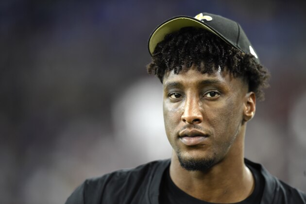 New Orleans Saints wide receiver Michael Thomas looks on from the bench during the second half of an NFL preseason football game against the Baltimore Ravens, Saturday, Aug. 14, 2021, in Baltimore. (AP Photo/Gail Burton)