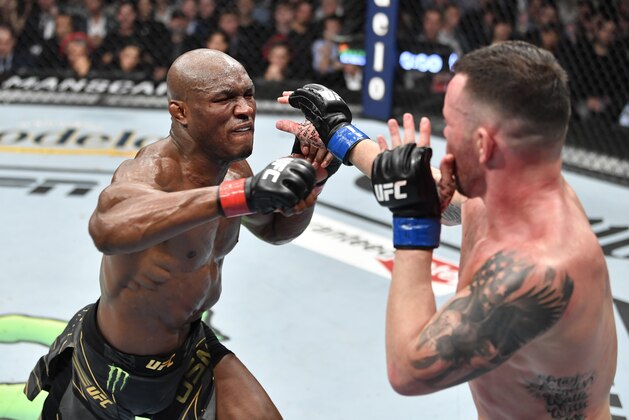 NEW YORK, NEW YORK - NOVEMBER 06: (L-R) Kamaru Usman of Nigeria punches Colby Covington in their UFC welterweight championship fight during the UFC 268 event at Madison Square Garden on November 06, 2021 in New York City. (Photo by Jeff Bottari/Zuffa LLC)