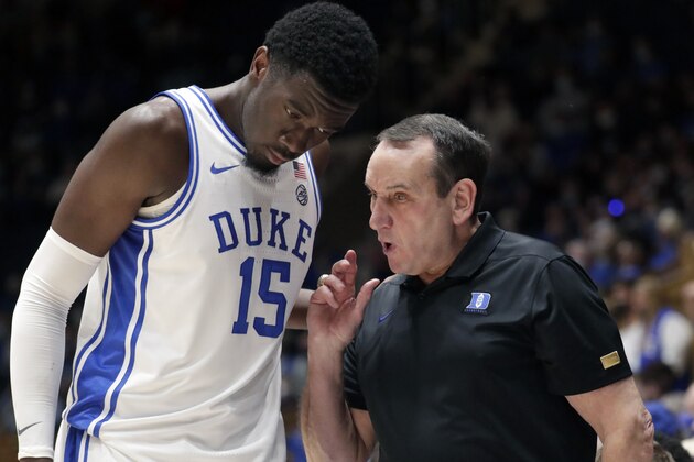 Duke center Mark Williams (15) gets direction from head coach Mike Krzyzewski during the first half of an NCAA college basketball game against Winston-Salem State Saturday, Oct. 30, 2021, in Durham, N.C. (AP Photo/Chris Seward)