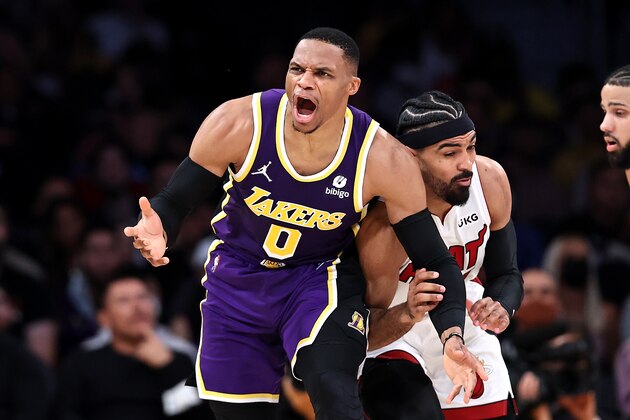 LOS ANGELES, CALIFORNIA - NOVEMBER 10: Russell Westbrook #0 of the Los Angeles Lakers reacts to being foulded by Gabe Vincent #2 of the Miami Heat during the first half of a game at Staples Center on November 10, 2021 in Los Angeles, California. NOTE TO USER: User expressly acknowledges and agrees that, by downloading and/or using this photograph, User is consenting to the terms and conditions of the Getty Images License Agreement.  (Photo by Sean M. Haffey/Getty Images)