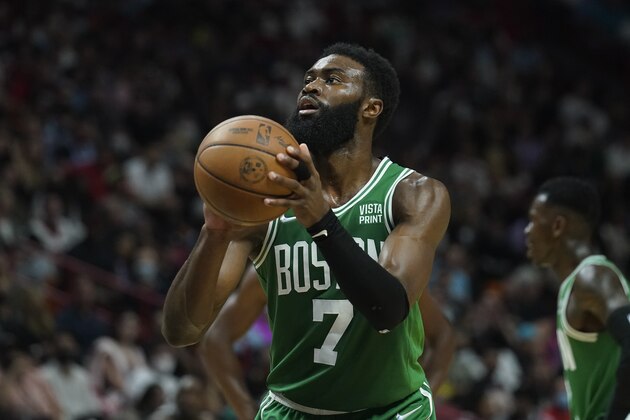 Boston Celtics guard Jaylen Brown (7) aims a free throw shot during the second half of an NBA basketball game against the Miami Heat, Thursday, Nov. 4, 2021, in Miami. (AP Photo/Marta Lavandier)
