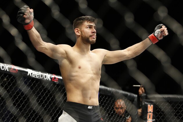 Yair Rodriguez celebrates after defeating Andre Fili during a featherweight mixed martial arts bout at UFC 197, Saturday, April 23, 2016, in Las Vegas. (AP Photo/John Locher)