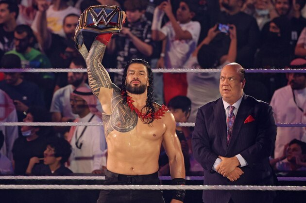 Roman Reigns greets the fans ahead of his match during the World Wrestling Entertainment (WWE) Crown Jewel pay-per-view in the Saudi capital Riyadh on October 21, 2021. (Photo by Fayez Nureldine / AFP) (Photo by FAYEZ NURELDINE/AFP via Getty Images)