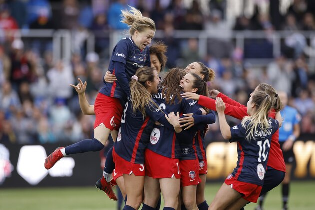 LOUISVILLE, KENTUCKY - NOVEMBER 20: The Washington Spirit celebrate defeating the Chicago Red Stars after the NWSL Championship held at Lynn Family Stadium on November 20, 2021 in Louisville, Kentucky.  (Photo by Joe Robbins/ISI Photos/Getty Images)