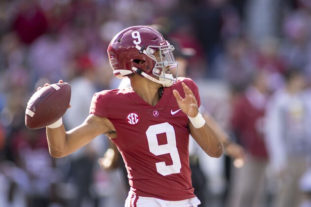 Alabama quarterback Bryce Young warms up for the team's NCAA college football game against Arkansas, Saturday, Nov. 20, 2021, in Tuscaloosa, Ala. (AP Photo/Vasha Hunt)