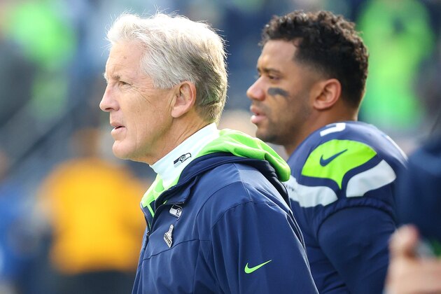 SEATTLE, WASHINGTON - NOVEMBER 21: Head Coach Pete Carroll of the Seattle Seahawks and Russell Wilson #3 look on before the game against the Arizona Cardinals at Lumen Field on November 21, 2021 in Seattle, Washington. (Photo by Abbie Parr/Getty Images)