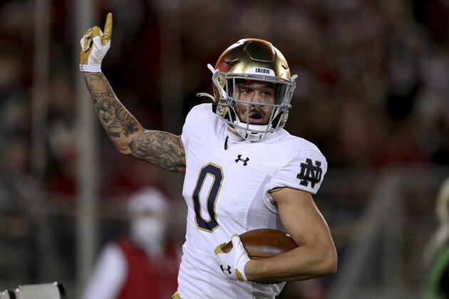 Notre Dame's Braden Lenzy celebrates after catching a pass for a touchdown against Stanford during the first half of an NCAA college football game in Stanford, Calif., Saturday, Nov. 27, 2021. (AP Photo/Jed Jacobsohn)