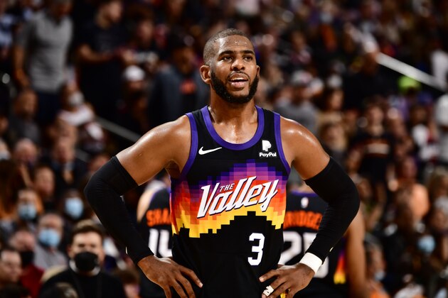 PHOENIX, AZ - NOVEMBER 30: Chris Paul #3 of the Phoenix Suns looks on during the game against the Golden State Warriors on November 30, 2021 at Footprint Center in Phoenix, Arizona. NOTE TO USER: User expressly acknowledges and agrees that, by downloading and or using this photograph, user is consenting to the terms and conditions of the Getty Images License Agreement. Mandatory Copyright Notice: Copyright 2021 NBAE (Photo by Barry Gossage/NBAE via Getty Images)