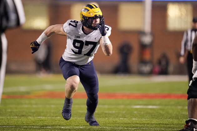 Michigan defensive end Aidan Hutchinson rushers in Maryland during the first half of an NCAA college football game, Saturday, Nov. 20, 2021, in College Park, Md. Michigan won 59-18. (AP Photo/Julio Cortez)
