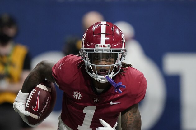 Alabama wide receiver Jameson Williams (1) runs toward the end zone for a touchdown against Georgia during the second half of the Southeastern Conference championship NCAA college football game, Saturday, Dec. 4, 2021, in Atlanta. (AP Photo/Brynn Anderson