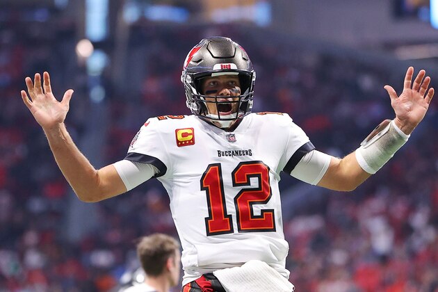 ATLANTA, GEORGIA - DECEMBER 05: Tom Brady #12 of the Tampa Bay Buccaneers reacts after a touchdown against the Atlanta Falcons during the first quarter at Mercedes-Benz Stadium on December 05, 2021 in Atlanta, Georgia. (Photo by Kevin C. Cox/Getty Images)