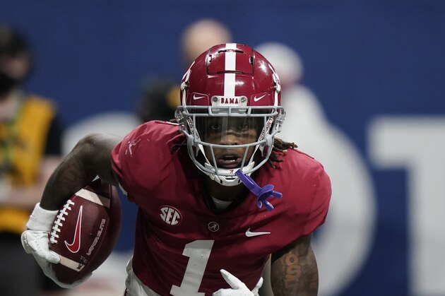 Alabama wide receiver Jameson Williams (1) runs toward the end zone for a touchdown against Georgia during the second half of the Southeastern Conference championship NCAA college football game, Saturday, Dec. 4, 2021, in Atlanta. (AP Photo/Brynn Anderson