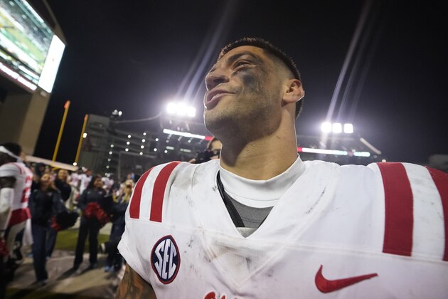 Mississippi quarterback Matt Corral howls following an NCAA college football game against Mississippi State, Thursday, Nov. 25, 2021, in Starkville, Miss. (AP Photo/Rogelio V. Solis)