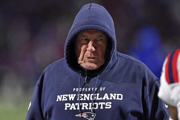 New England Patriots head coach Bill Belichick walks the sideline during the first half of an NFL football game against the Buffalo Bills in Orchard Park, N.Y., Monday, Dec. 6, 2021. (AP Photo/Adrian Kraus)