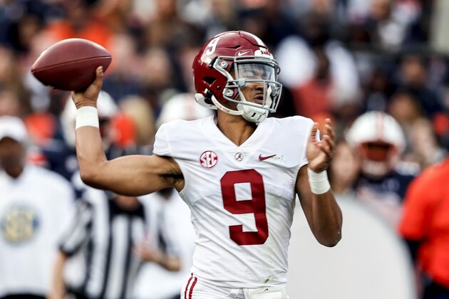 Alabama quarterback Bryce Young (9) throws a pass against Auburn during the first half of an NCAA college football game Saturday, Nov. 27, 2021, in Auburn, Ala. (AP Photo/Butch Dill)