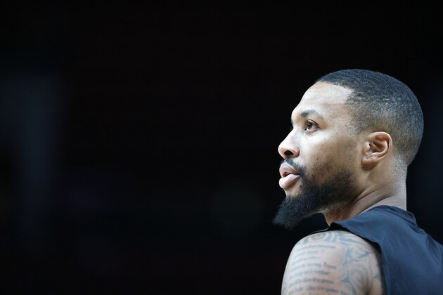 PORTLAND, OREGON - DECEMBER 06: Damian Lillard # 0 of the Portland Trail Blazers participates in shoot around before the game against the Los Angeles Clippers at Moda Center on December 06, 2021 in Portland, Oregon. NOTE TO USER: User expressly acknowledges and agrees that, by downloading and or using this photograph, User is consenting to the terms and conditions of the Getty Images License Agreement. (Photo by Soobum Im/Getty Images)