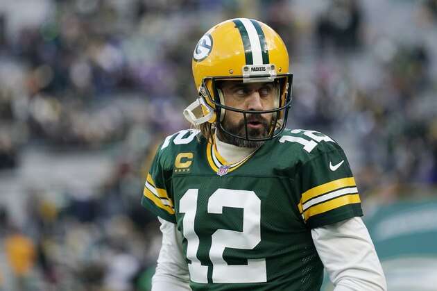 GREEN BAY, WISCONSIN - NOVEMBER 28: Aaron Rodgers #12 of the Green Bay Packers looks on during pregame warm-ups before the game against the Los Angeles Rams at Lambeau Field on November 28, 2021 in Green Bay, Wisconsin. (Photo by Patrick McDermott/Getty Images)