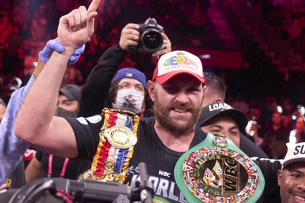 Boxing: WBC Heavyweight Title: Tyson Fury victorious, wearing championship belts after knocking out Deontay Wilder at T-Mobile Arena. Paradise, NV 10/9/2021 CREDIT: Erick W. Rasco (Photo by Erick W. Rasco/Sports Illustrated via Getty Images) (Set Number: X163827 TK1)