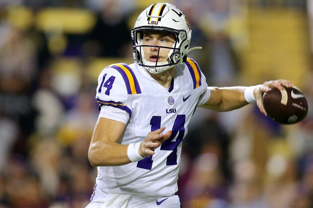 BATON ROUGE, LOUISIANA - NOVEMBER 27: Max Johnson #14 of the LSU Tigers throws the ball during the first half against the Texas A&M Aggies at Tiger Stadium on November 27, 2021 in Baton Rouge, Louisiana. (Photo by Jonathan Bachman/Getty Images)