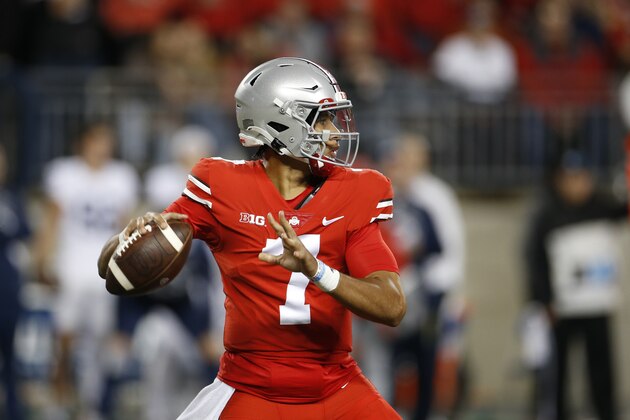 Ohio State quarterback C.J. Stroud plays against Penn State during an NCAA college football game Saturday, Oct. 30, 2021, in Columbus, Ohio. (AP Photo/Jay LaPrete)