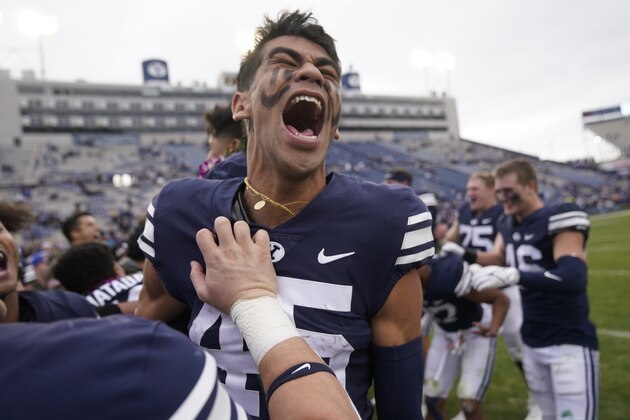 BYU wide receiver Samson Nacua (45) and his teammates celebrate after their NCAA college football game against Idaho State Saturday, Nov. 6, 2021, in Provo, Utah. (AP Photo/Rick Bowmer)