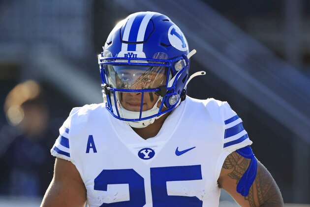 STATESBORO, GA - NOVEMBER 20: Tyler Allgeier #25 of the Brigham Young Cougars warms up before the game at Allen E. Paulson Stadium on November 20, 2021 in Statesboro, Georgia. (Photo by Corey Perrine/Getty Images)