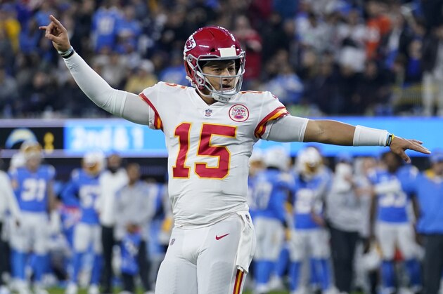 Kansas City Chiefs quarterback Patrick Mahomes reacts after throwing a touchdown pass to wide receiver Tyreek Hill during the second half of an NFL football game against the Los Angeles Chargers, Thursday, Dec. 16, 2021, in Inglewood, Calif. (AP Photo/Marcio Jose Sanchez)