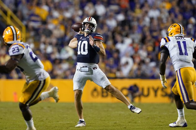 Auburn quarterback Bo Nix (10) passes in the second half of an NCAA college football game against LSU in Baton Rouge, La., Saturday, Oct. 2, 2021. Auburn won 24-19. (AP Photo/Gerald Herbert)