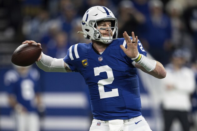Indianapolis Colts quarterback Carson Wentz (2) throws downfield during an NFL football game against the New England Patriots, Saturday, Dec. 18, 2021, in Indianapolis. (AP Photo/Zach Bolinger)