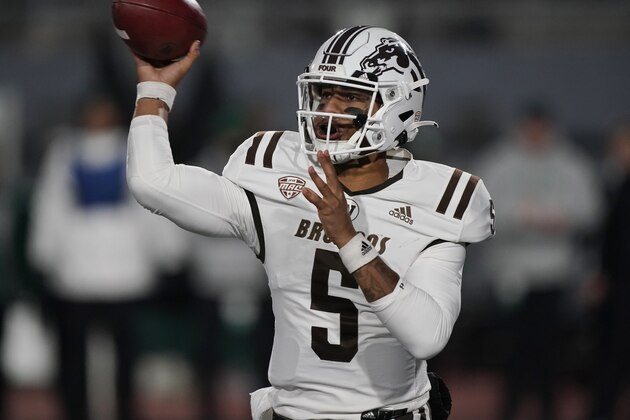 Western Michigan quarterback Kaleb Eleby throws during the first half of an NCAA college football game against Eastern Michigan, Tuesday, Nov. 16, 2021, in Ypsilanti, Mich. (AP Photo/Carlos Osorio)