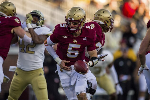 Boston College quarterback Phil Jurkovec (5) drops back to hand off during the first half of an NCAA college football game against Georgia Tech, Saturday, Nov. 13, 2021, in Atlanta. Boston College won 41-30. (AP Photo/Danny Karnik)