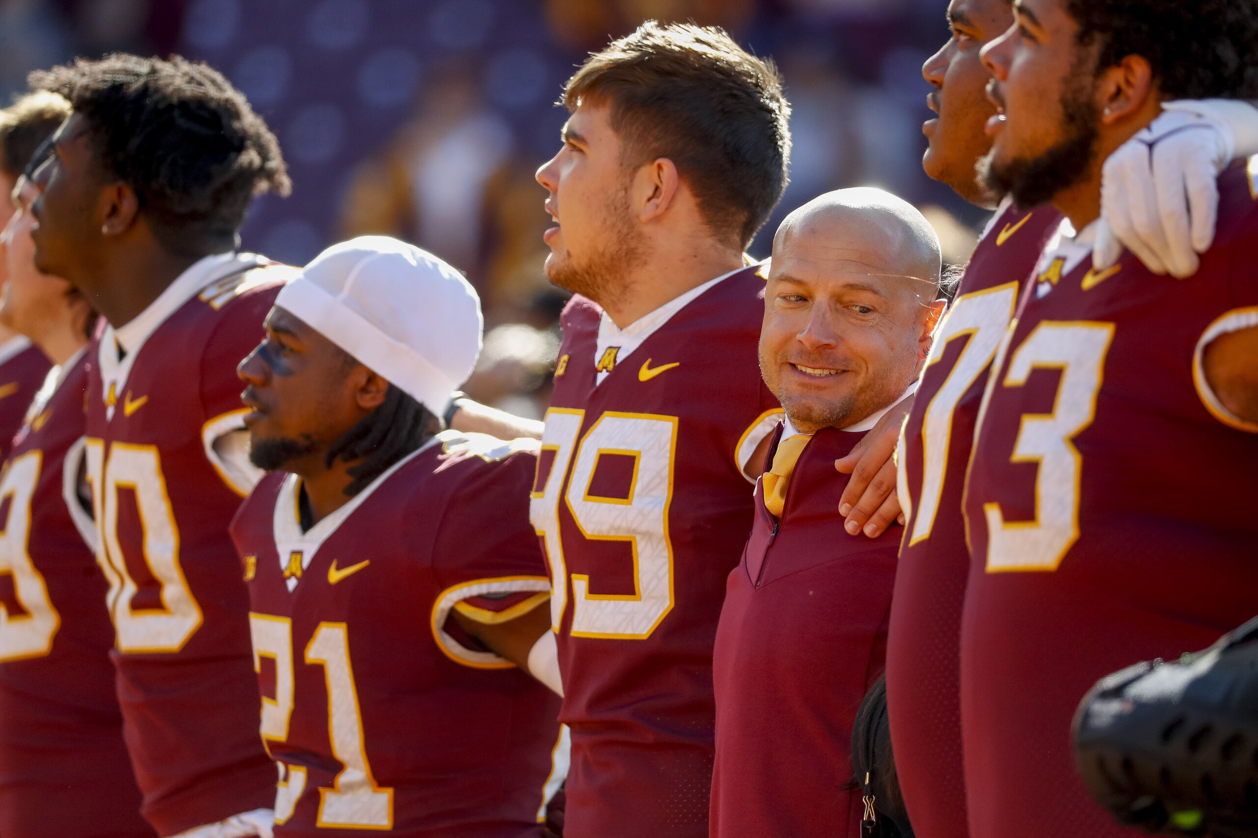 Minnesota head coach P.J. Fleck sings with his players after his team played Nebraska at an NCAA college football game Saturday, Oct. 16, 2021, in Minneapolis. (AP Photo/Bruce Kluckhohn)