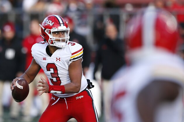Maryland quarterback Taulia Tagovailoa (3) looks to pass against Rutgers during the second half of an NCAA football game, Saturday, Nov. 27, 2021, in Piscataway, N.J. Maryland won 40-16. (AP Photo/Noah K. Murray)