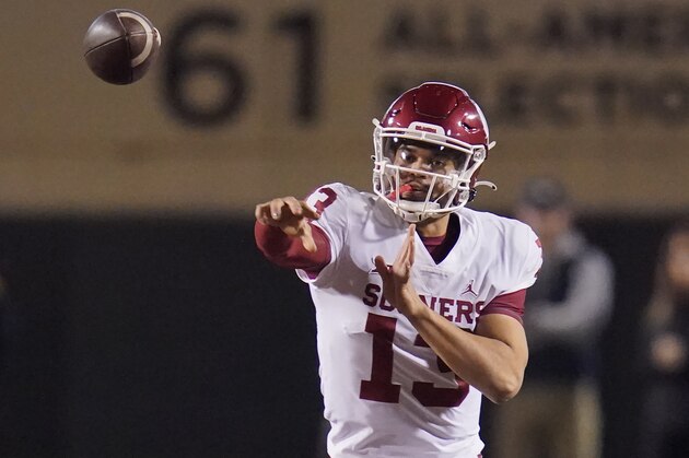 Oklahoma quarterback Caleb Williams (13) during an NCAA college football game against Oklahoma State, Saturday, Nov. 27, 2021, in Stillwater, Okla. (AP Photo/Sue Ogrocki)
