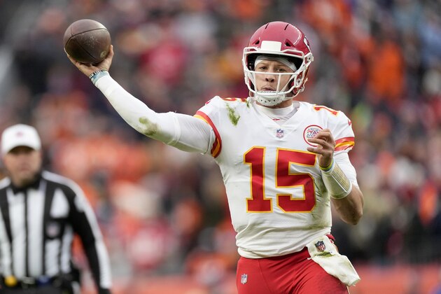 Kansas City Chiefs quarterback Patrick Mahomes (15) passes against the Denver Broncos during the first half of an NFL football game Saturday, Jan. 8, 2022, in Denver. (AP Photo/David Zalubowski)