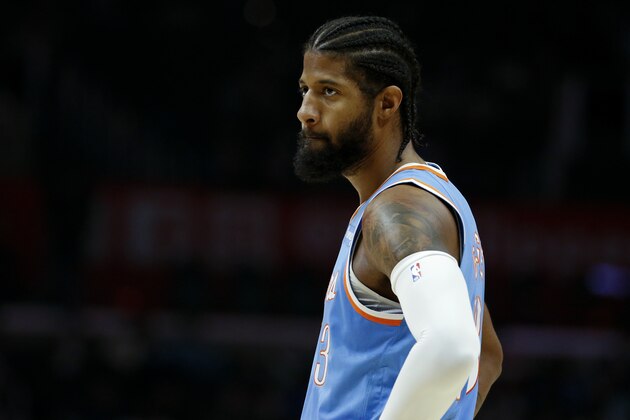 Los Angeles Clippers forward Paul George (13) looks on during the second half of an NBA basketball game against the Detroit Pistons, Friday, Nov. 26, 2021, in Los Angeles. The Clippers won 107-96. (AP Photo/Ringo H.W. Chiu)