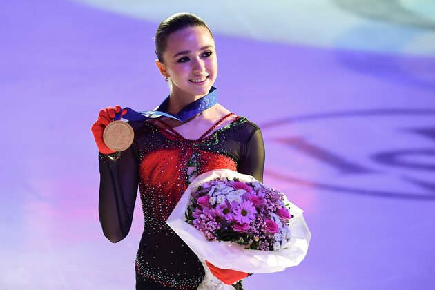 First-placed Kamila Valieva of Russia poses for photos during the awarding ceremony for the women's competition at the ISU European Figure Skating Championships in Tallinn, Estonia, Jan. 15, 2022. (Photo by Sergei  Stepanov/Xinhua via Getty Images)