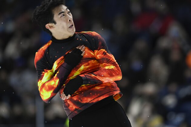 Nathan Chen competes in the men's free skate program during the U.S. Figure Skating Championships Sunday, Jan. 9, 2022, in Nashville, Tenn. (AP Photo/Mark Zaleski)