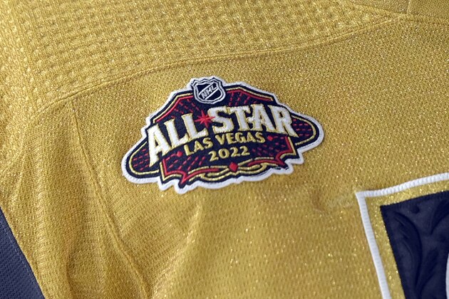 A patch for the 2022 NHL All-Star game is affixed to the jersey of Vegas Golden Knights goaltender Robin Lehner during the first period of the team's NHL hockey game against the Buffalo Sabres on Tuesday, Feb. 1, 2022, in Las Vegas. (AP Photo/David Becker)