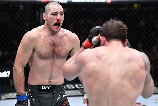 LAS VEGAS, NEVADA - FEBRUARY 05: (L-R) Sean Strickland trash talks Jack Hermansson of Sweden in their middleweight fight during the UFC Fight Night event at UFC APEX on February 05, 2022 in Las Vegas, Nevada. (Photo by Chris Unger/Zuffa LLC)