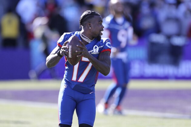 NFC return specialist Jakeem Grant of the Chicago Bears runs with the ball during Pro Bowl NFL football practice, Friday, February 4, 2022, in Las Vegas. (Gregory Payan/AP Images for NFL)