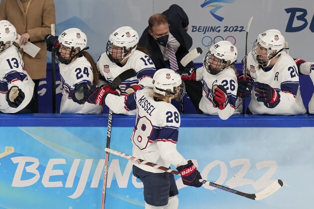 United States' Amanda Kessel (28) is congratulated after scoring a goal against Finland during a preliminary round women's hockey game at the 2022 Winter Olympics, Thursday, Feb. 3, 2022, in Beijing. (AP Photo/Petr David Josek)