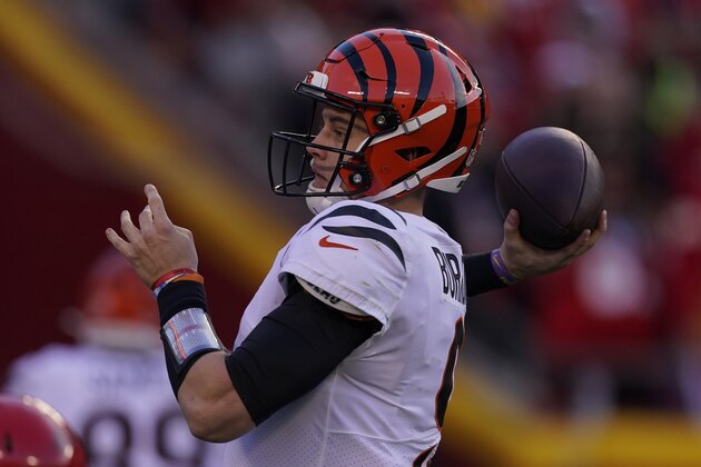 Cincinnati Bengals quarterback Joe Burrow throws a pass during the second half of the AFC championship NFL football game against the Kansas City Chiefs, Sunday, Jan. 30, 2022, in Kansas City, Mo. (AP Photo/Charlie Riedel)