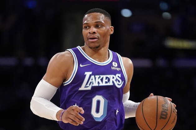 Los Angeles Lakers guard Russell Westbrook dribbles during the first half of an NBA basketball game against the New York Knicks Saturday, Feb. 5, 2022, in Los Angeles. (AP Photo/Mark J. Terrill)