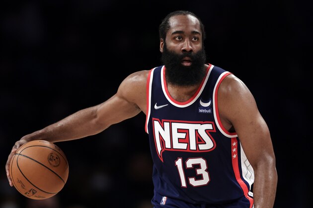 Brooklyn Nets guard James Harden (13) looks to pass against the Philadelphia 76ers during the second half of an NBA basketball game Thursday, Dec. 30, 2021, in New York. 76ers won 110-102. (AP Photo/Adam Hunger)