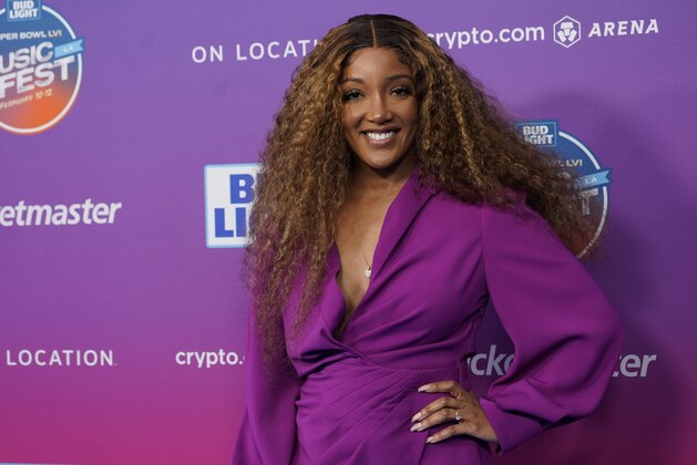 Mickey Guyton arrives at day two of the Bud Light Super Bowl Music Fest on Friday, Feb. 11, 2022, at Crypto.com Arena in Los Angeles. (AP Photo/Chris Pizzello)