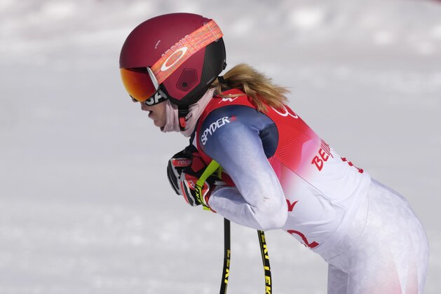 Mikaela Shiffrin, of the United States after finishing women's downhill training at the 2022 Winter Olympics, Monday, Feb. 14, 2022, in the Yanqing district of Beijing. (AP Photo/Luca Bruno)