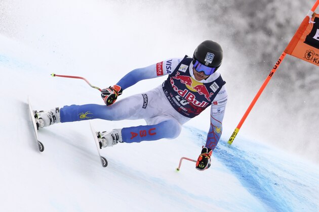 United States' Ryan Cochran Siegle speeds down the course during an alpine ski, men's World Cup downhill, in Kitzbuehel, Austria, Sunday, Jan. 23, 2022. (AP Photo/Marco Trovati)